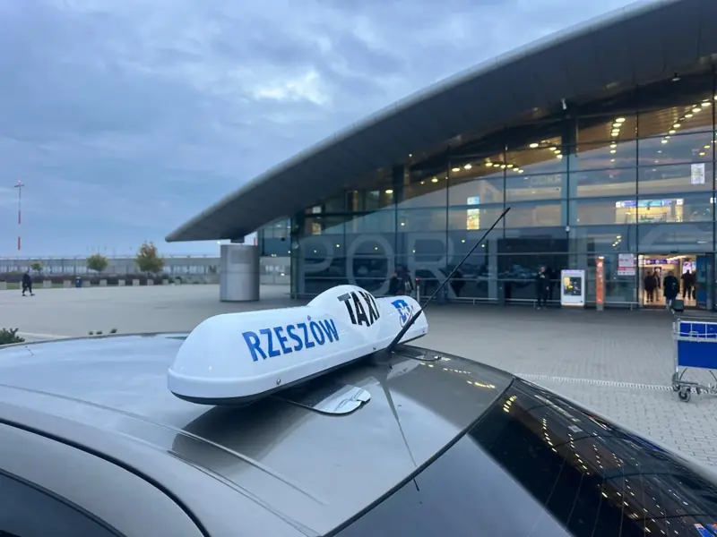 Taxi Rzeszów – illuminated TAXI sign in front of the terminal